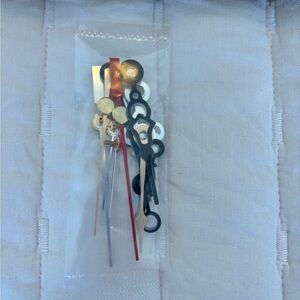 Assorted Watch Hands Set in Gold, Silver, and Black